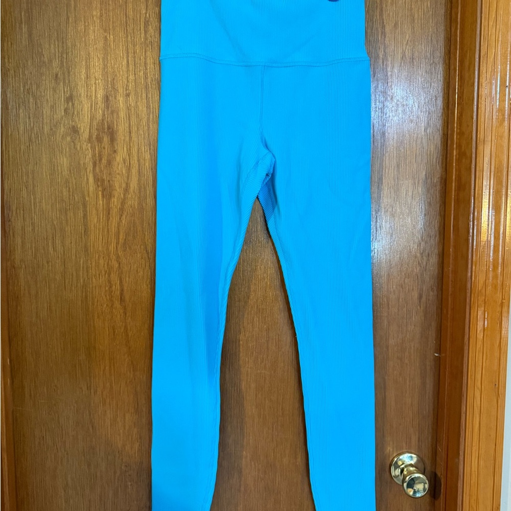 ATHLETA ELATION RIBBED TIGHT
LEGGING COTELÉ ELATION